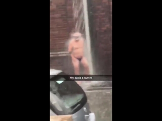 porn dad stands under overflowing gutter wearing just swimming trunks and a snorkel hd